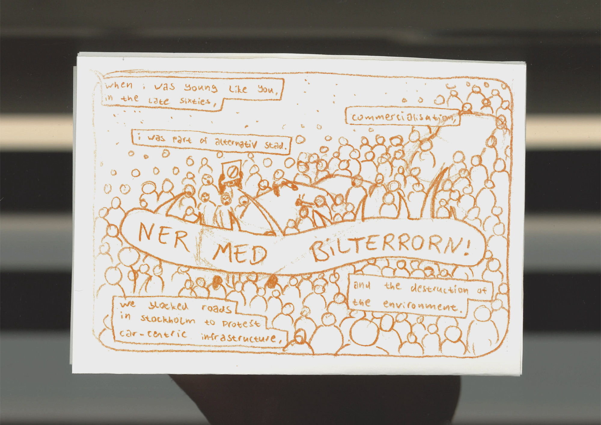 a frame of a big crowd blocking traffic, screaming 